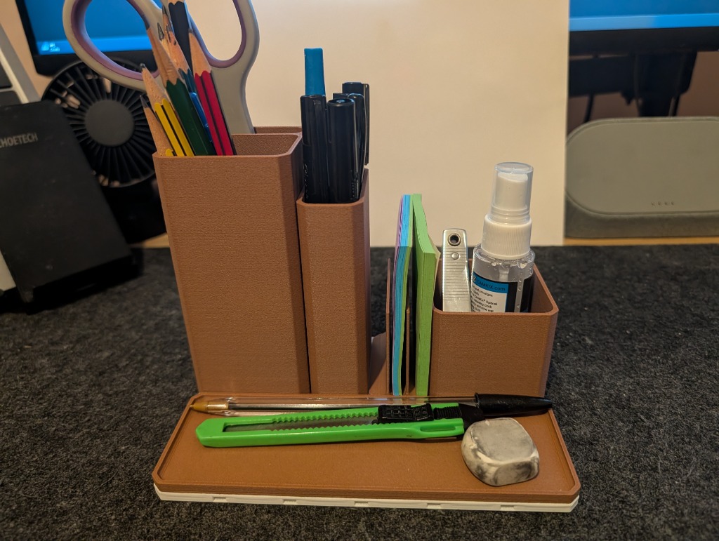Fully loaded OpenGrid Desk Organiser on the desktop